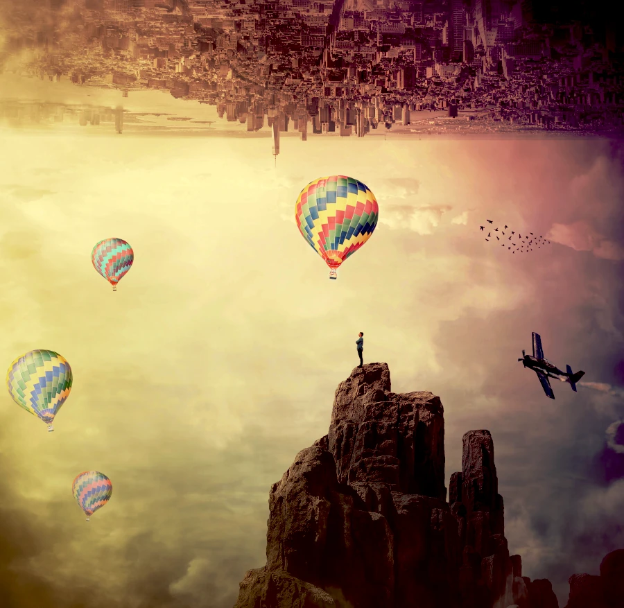 Latające balony na tle gór i miast